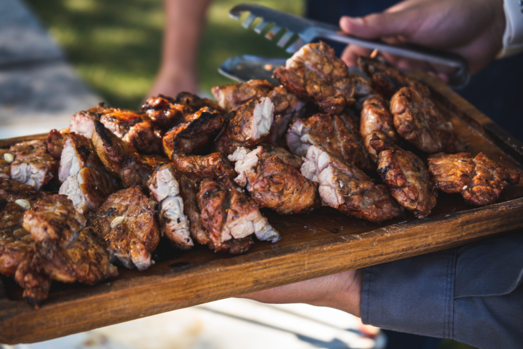 Freshly grilled sweetbreads served on wooden tray