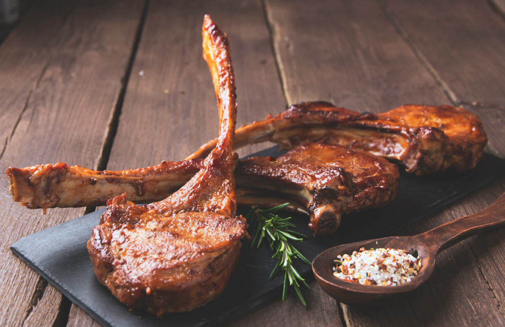 grilled lamb ribs loin on a stone surface