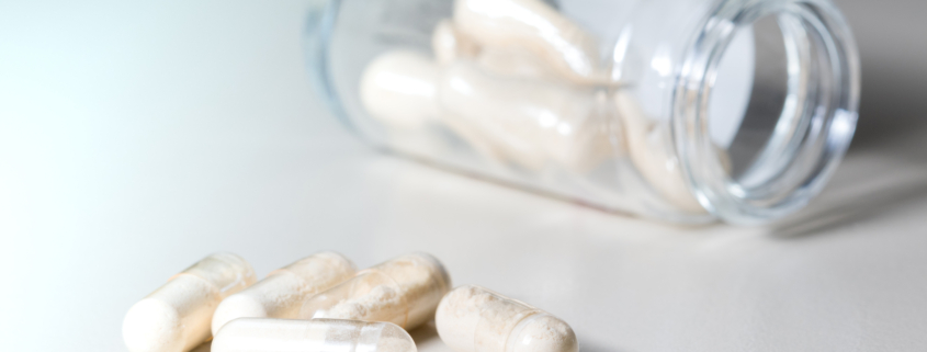 Yellow transparent Antibiotics capsule in glass bottle