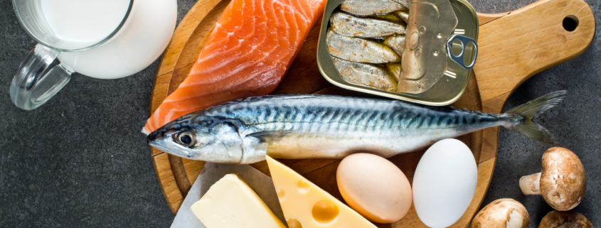 Foods rich in natural vitamin D as fish, eggs, cheese, milk, butter, mushrooms, canned sardines