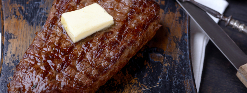 Grilled beef steak and butter
