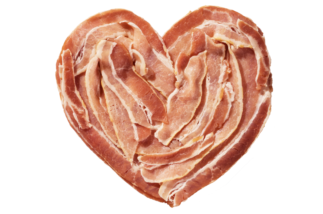 raw bacon heart isolated on a white background
