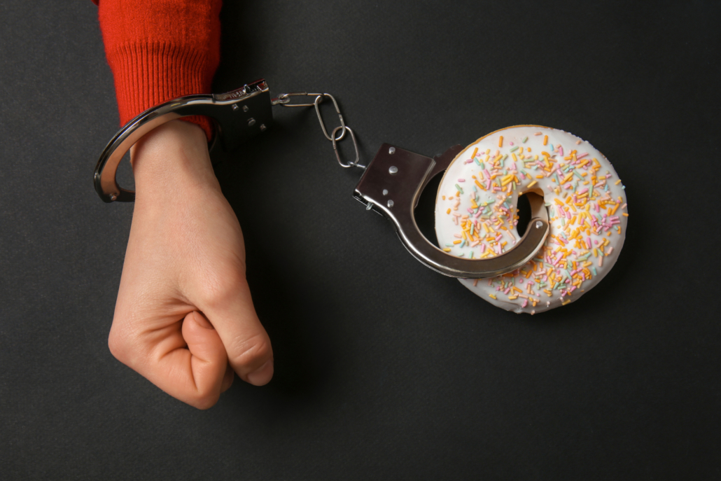 arm handcuffed to a donut