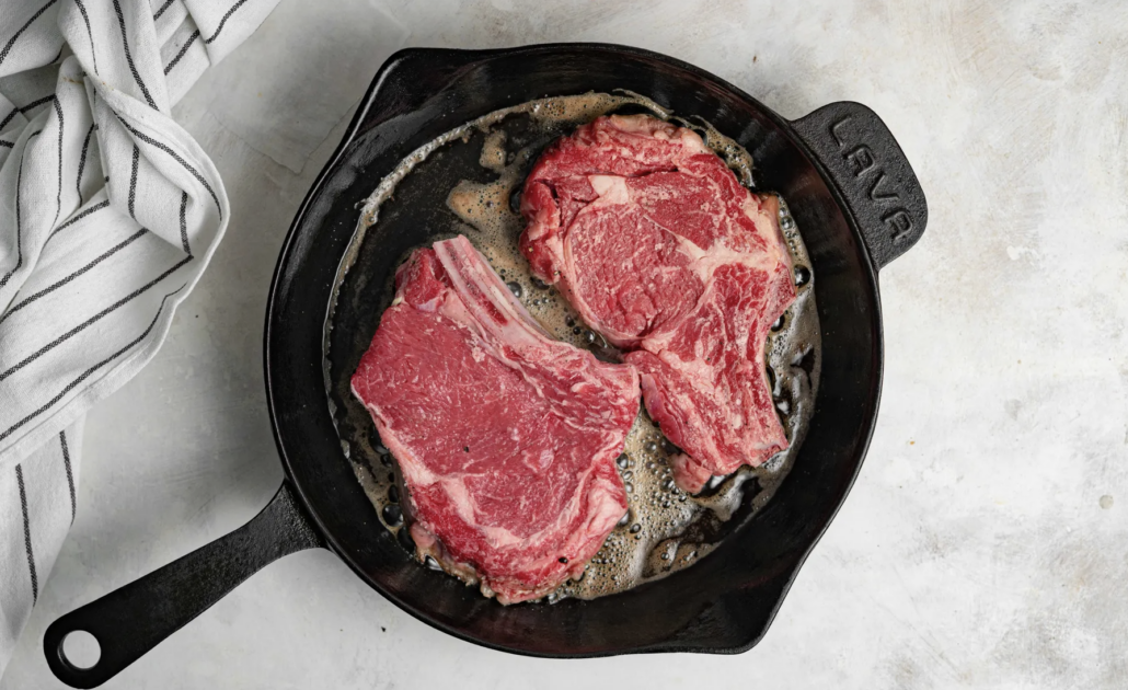 ribeye steak in a pan