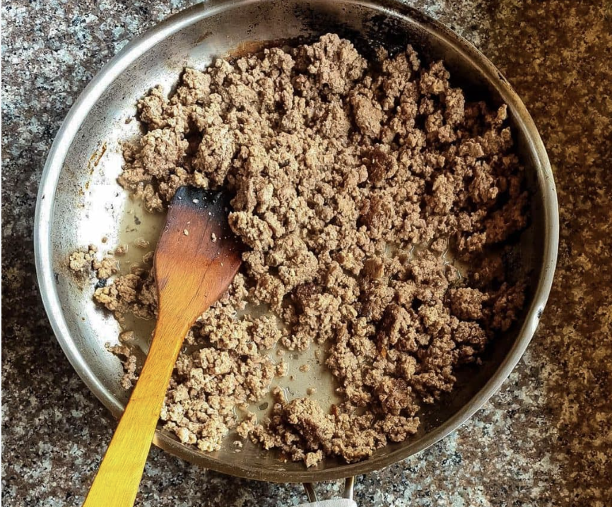 close up of beef in a pan