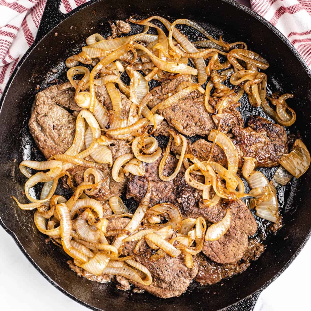 close up of liver and onions in skillet