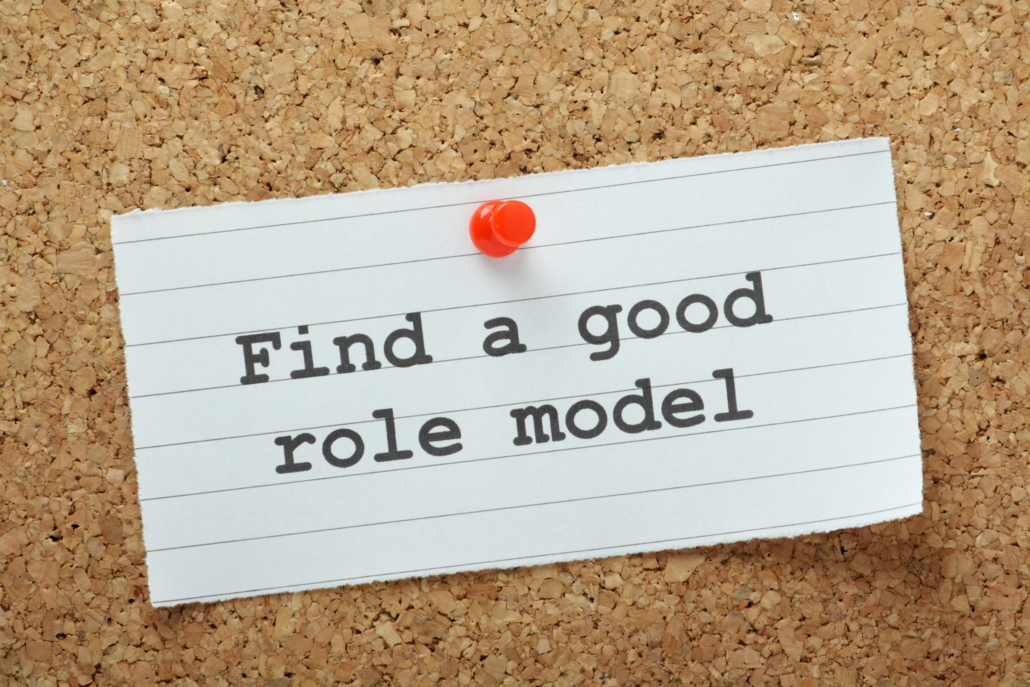 The phrase Find a Good Role Model on a notice board