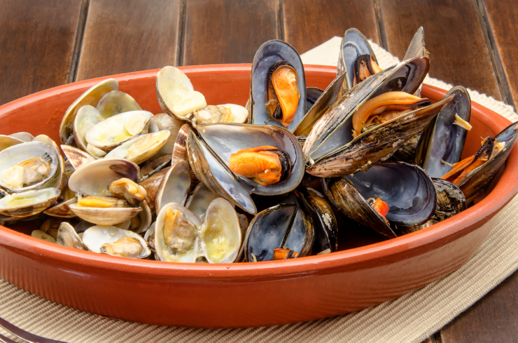 Clams and mussels with garlic served in a casserole